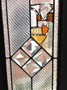 I backed the leaded glass with insulated glass panels, which reduced the airflow in the living room, and provided additional structure.